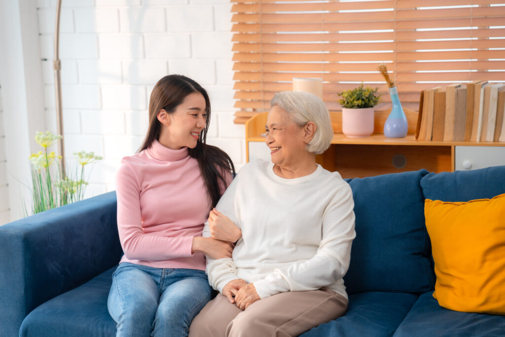 woman visiting her gray haired grandmother at home 2026 03 24 22 44 21 utc