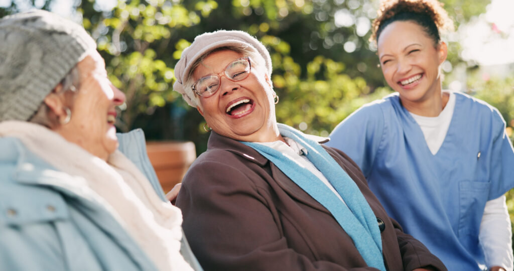 nurse senior women and laughing at park for funny 2026 03 25 04 41 34 utc