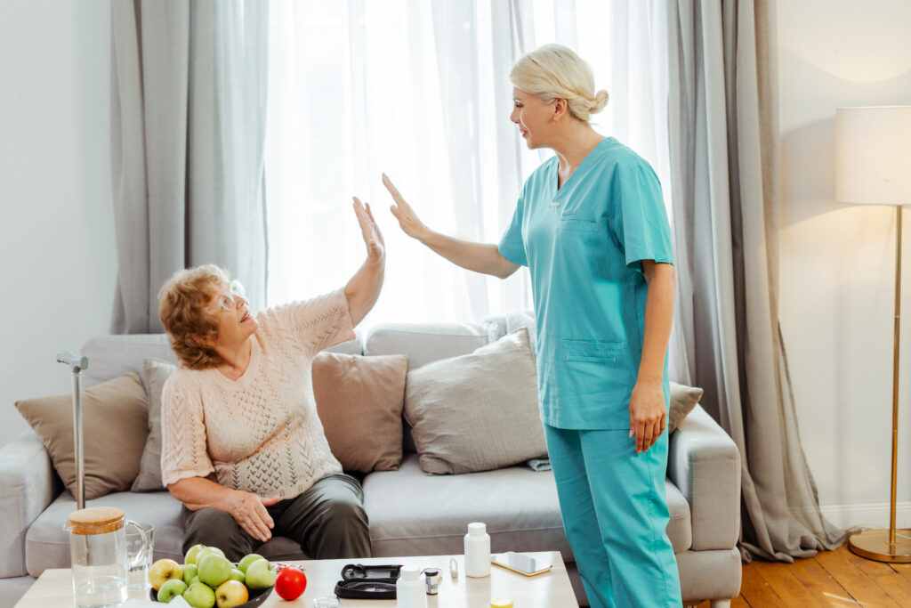 senior woman giving high five to health profession 2026 01 08 05 57 54 utc